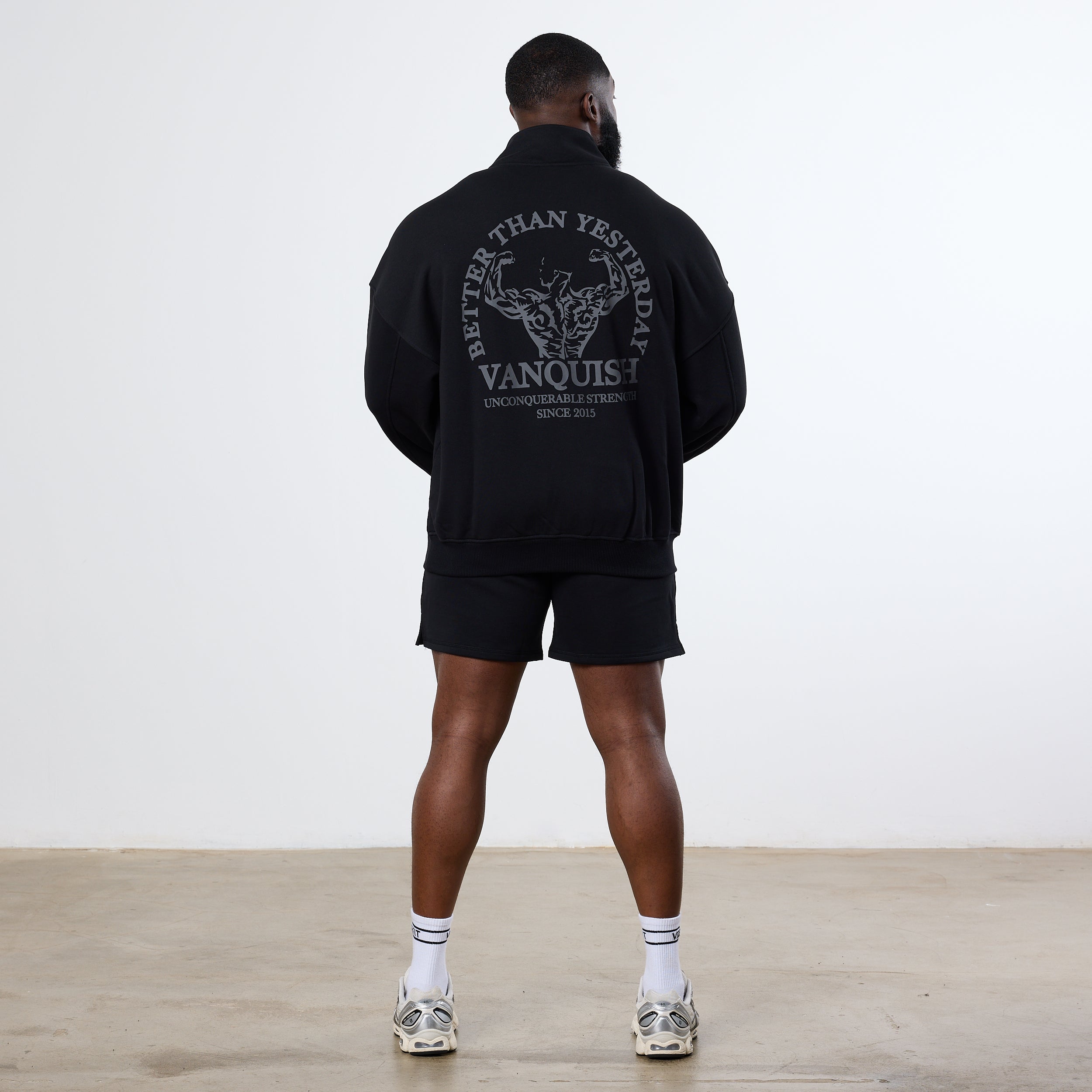 Vanquish Black Unconquerable Strength Quarter Zip Sweater