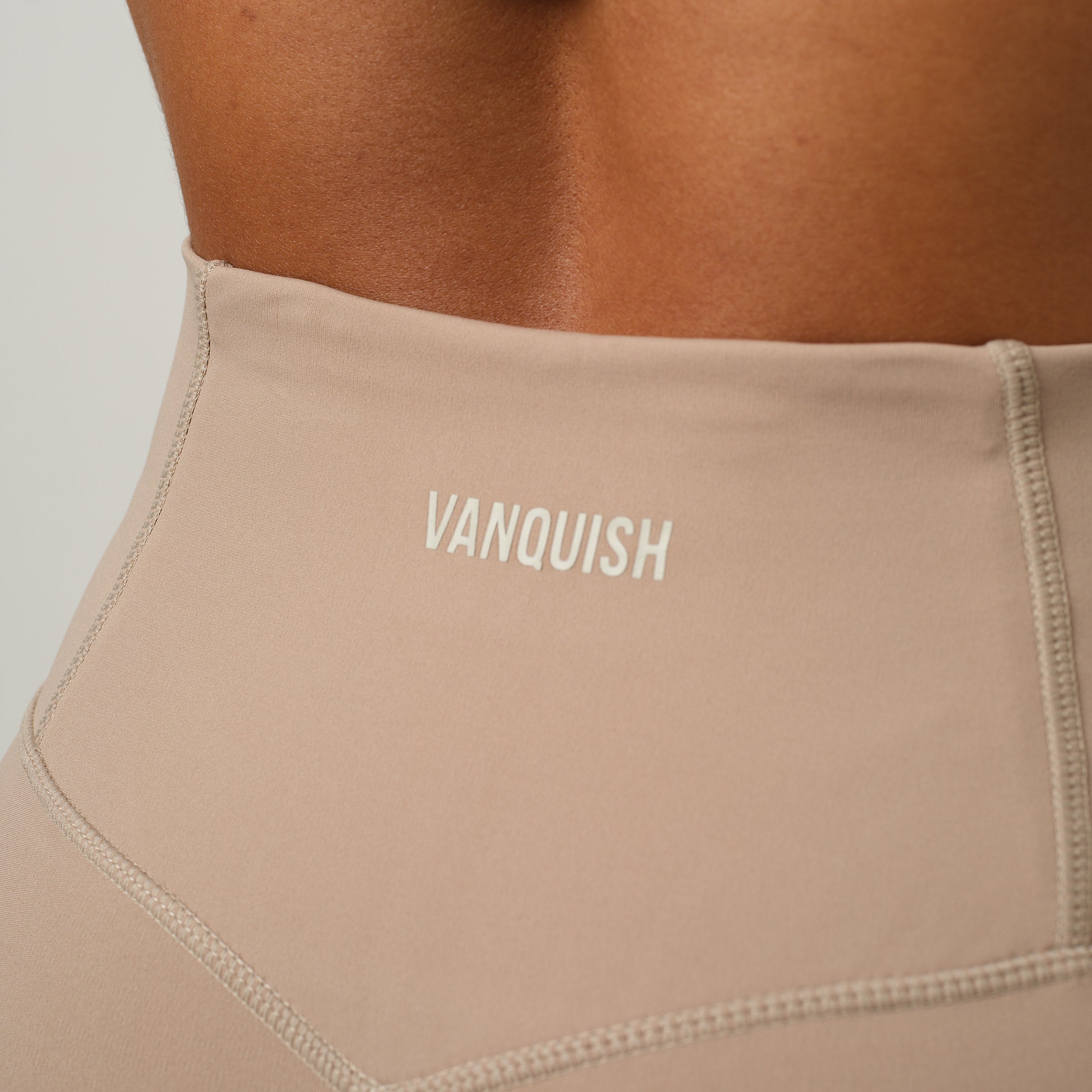 VANQUISH ENHANCE LATTE PETITE HIGH-WAIST FLARED LEGGING